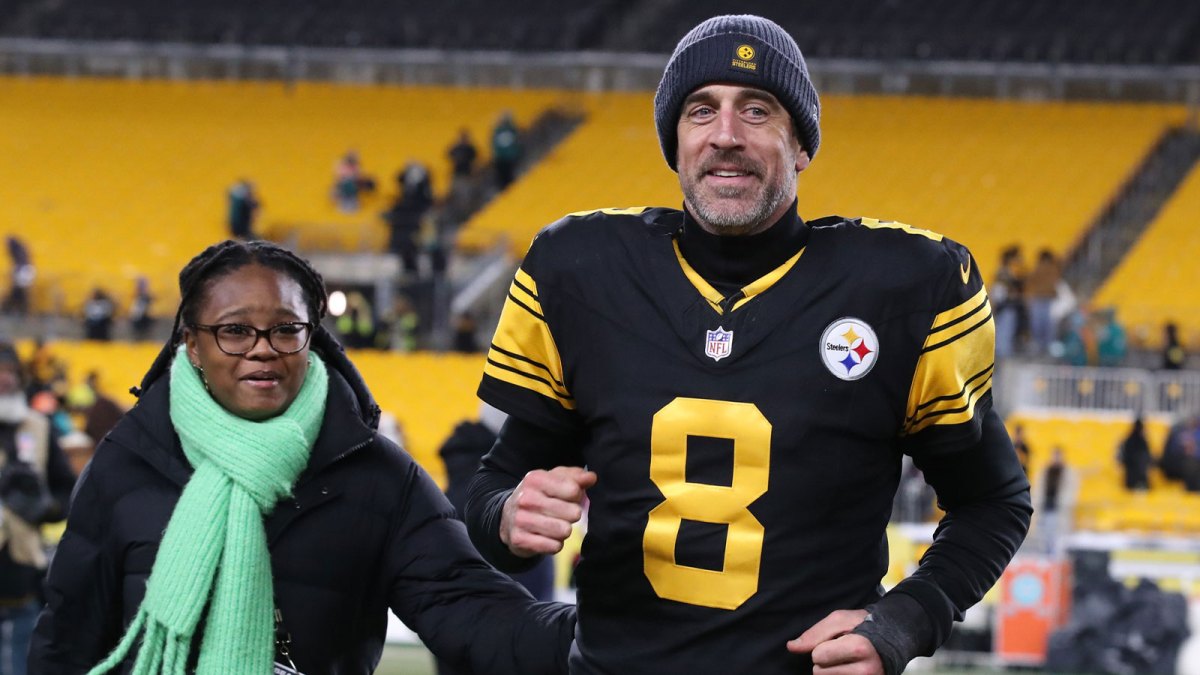 Pittsburgh Steelers quarterback Aaron Rodgers (8) runs off the field after the game against the Miami Dolphins at Acrisure Stadium.