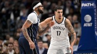Dallas Mavericks forward Anthony Davis (3) and Brooklyn Nets forward Michael Porter Jr. (17) look for the ball during the second half at the American Airlines Center.