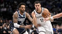 Brooklyn Nets forward Michael Porter Jr. (17) drives to the basket past Dallas Mavericks forward P.J. Washington (25) during the second half at the American Airlines Center.