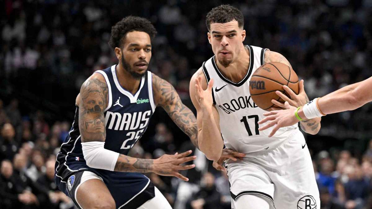 Brooklyn Nets forward Michael Porter Jr. (17) drives to the basket past Dallas Mavericks forward P.J. Washington (25) during the second half at the American Airlines Center.
