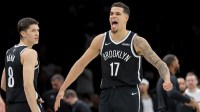 Brooklyn Nets forward Michael Porter Jr. (17) reacts with guard Egor Demin (8) during the fourth quarter against the Charlotte Hornets at Barclays Center.