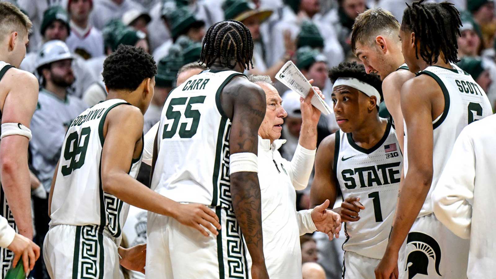 Michigan State's head coach Tom Izzo, center, huddles with the team during the second half in the game against Duke on Saturday, Dec. 6, 2025, at the Breslin Center in East Lansing
