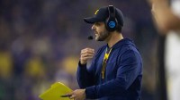 ; Michigan Wolverines defensive coordinator Jesse Minter against the Washington Huskies during the 2024 College Football Playoff national championship game at NRG Stadium
