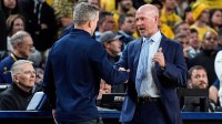 Michigan head coach Dusty May shakes hands with Villanova head coach Kevin Willard after 89-61 win at Crisler Center in Ann Arbor on Tuesday, Dec. 9, 2025.