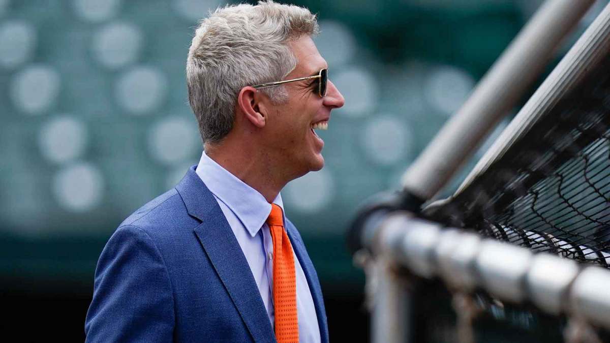 Baltimore Orioles general manager Mike Elias reacts on the field before the game between the Baltimore Orioles and the Tampa Bay Rays at Oriole Park at Camden Yards.