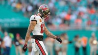 Tampa Bay Buccaneers wide receiver Mike Evans (13) walks on the field during the fourth quarter against the Miami Dolphins at Hard Rock Stadium