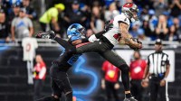 Tampa Bay Buccaneers wide receiver Mike Evans (13) tries to makes a catch against Detroit Lions cornerback Rock Ya-Sin (23) during the first half at Ford Field in Detroit