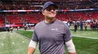 Seattle Seahawks head coach Mike MacDonald walks off the field after a victory over the Atlanta Falcons at Mercedes-Benz Stadium