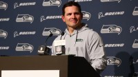 Seattle Seahawks head coach Mike MacDonald speaks in a press conference after defeating the Los Angeles Rams at Lumen Field.