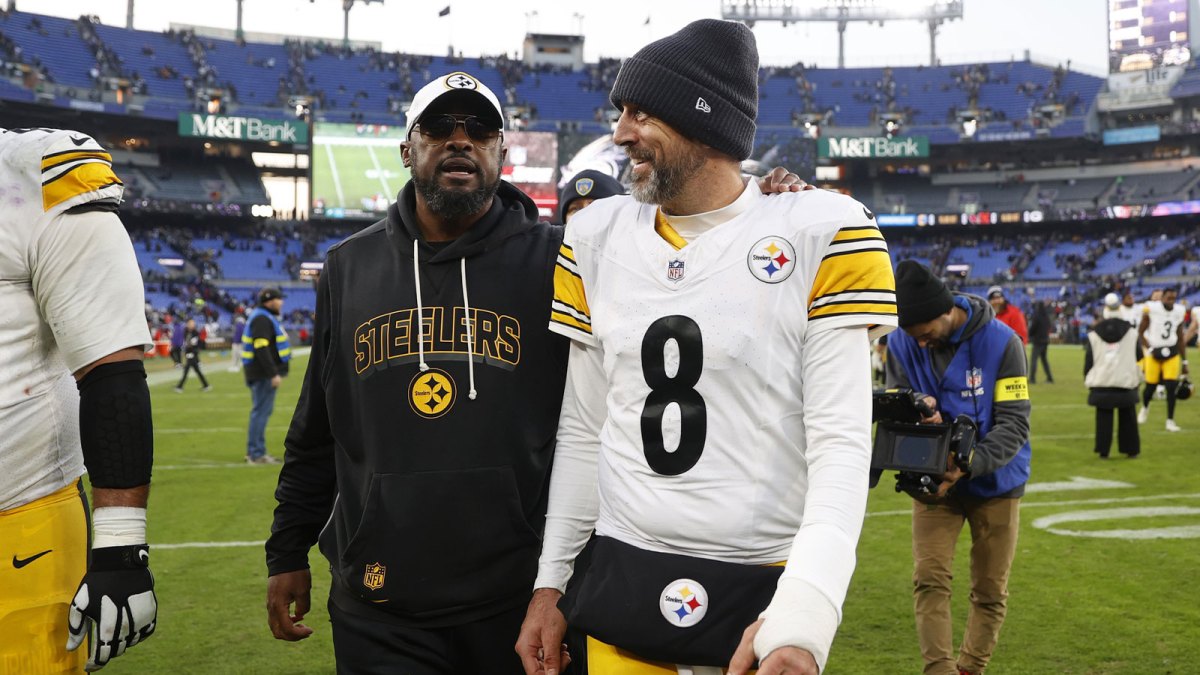 Pittsburgh Steelers head coach Mike Tomlin and quarterback Aaron Rodgers (8) walk off the field after the game against the Baltimore Ravens at M&T Bank Stadium.