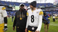 Pittsburgh Steelers head coach Mike Tomlin and quarterback Aaron Rodgers (8) walk off the field after the game against the Baltimore Ravens at M&T Bank Stadium.