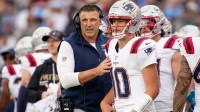 New England Patriots coach Mike Vrabel talks to quarterback Drake Maye (10) during the second quarter at Nissan Stadium in Nashville, Tenn., Sunday, Oct. 19, 2025.