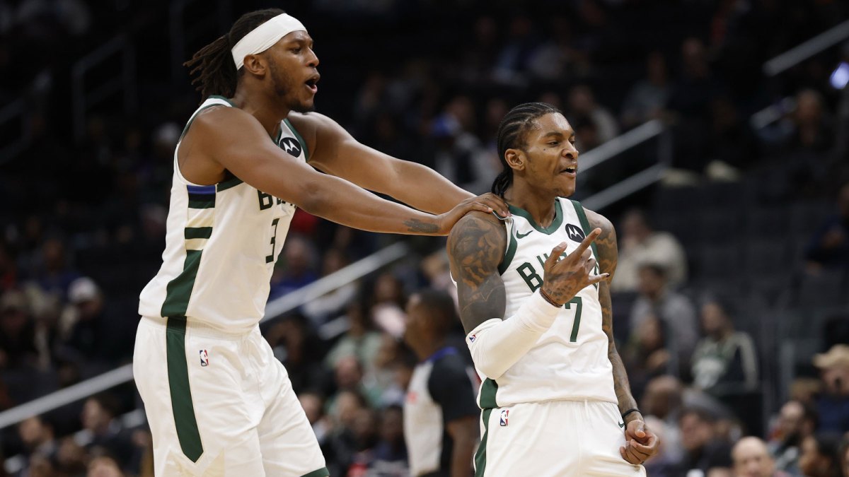 Milwaukee Bucks guard Kevin Porter Jr. (7) celebrates with Bucks center Myles Turner (3) after a three point field goal against the Washington Wizards in the third quarter at Capital One Arena.