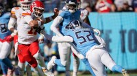 Kansas City Chiefs quarterback Gardner Minshew (17) dodges Tennessee Titans linebacker James Williams Sr. (52) during the first quarter at Nissan Stadium in Nashville, Tenn., Sunday, Dec. 21, 2025.