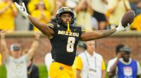 Missouri Tigers defensive end Damon Wilson II (8) celebrates after recovering a fumble during the second half against the Alabama Crimson Tide at Faurot Field at Memorial Stadium.
