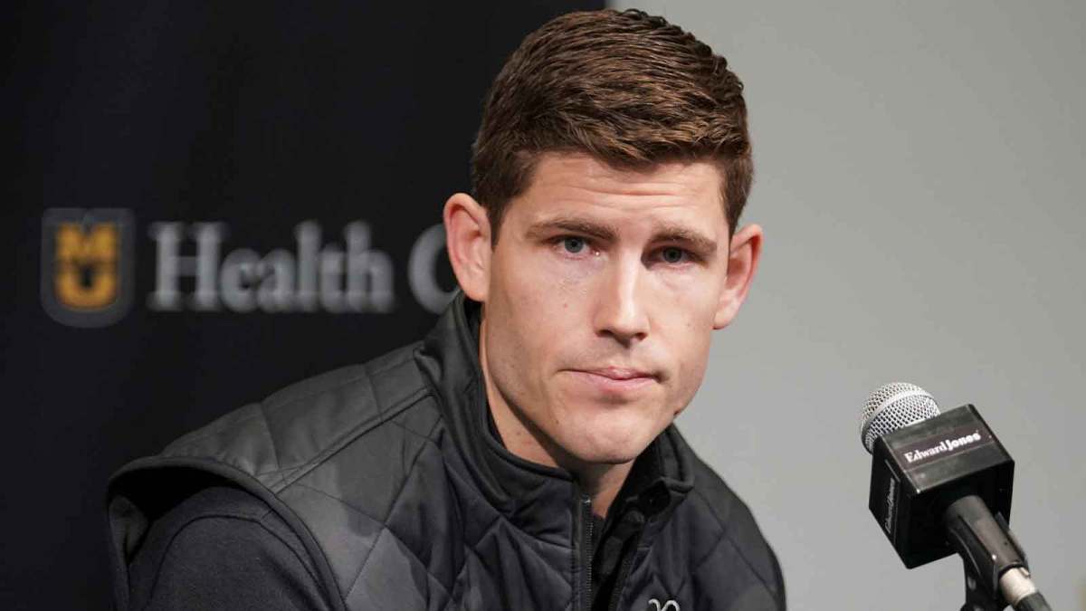 Missouri Tigers football team new offensive coordinator/quarterbacks coach Kirby Moore answers questions from reporters before the basketball game against the Vanderbilt Commodores Mizzou Arena.