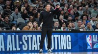 San Antonio Spurs head coach Mitch Johnson points in the first half against the Cleveland Cavaliers at Frost Bank Center.