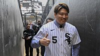 New Chicago White Sox player Munetaka Murakami gives a thumbs up after a press conference where he was introduced at Rate Field.