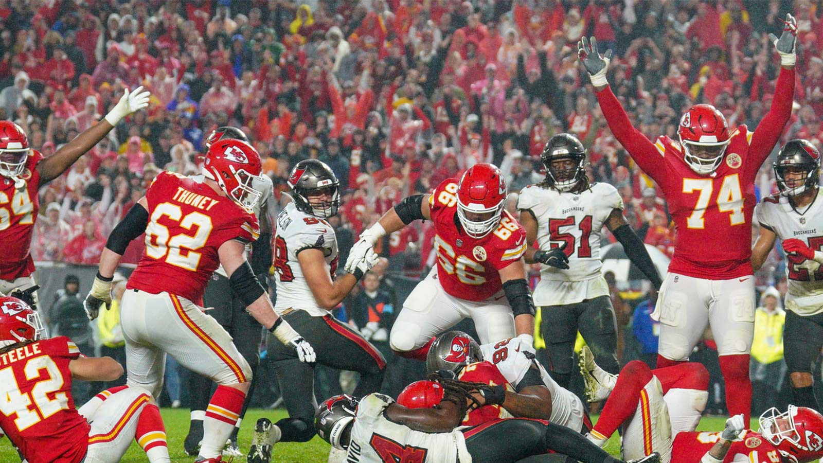 Kansas City Chiefs running back Kareem Hunt (29) score the game-winning touchdown in overtime against the Tampa Bay Buccaneers at GEHA Field at Arrowhead Stadium.