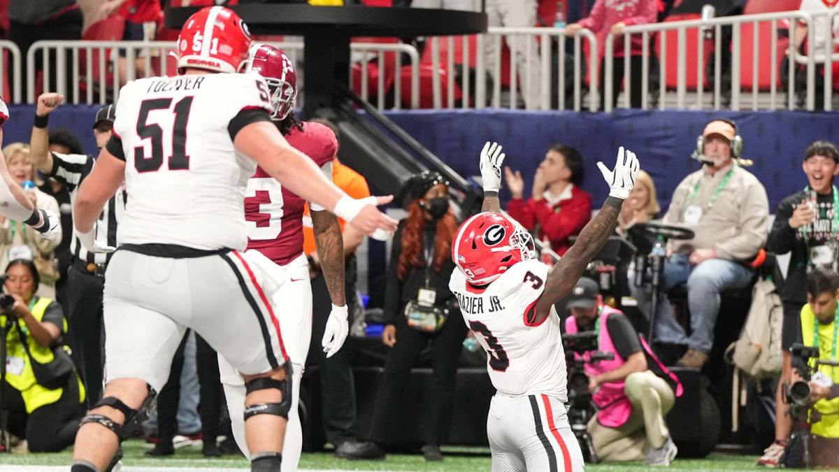 Georgia Bulldogs running back Nate Frazier (3) celebrates after scoring a touchdown during the third quarter against the Alabama Crimson Tide during the 2025 SEC Championship game at Mercedes-Benz Stadium.