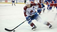 Colorado Avalanche center Nathan MacKinnon (29) controls the puck in the first period against the New York Rangers at Madison Square Garden.