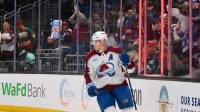 Colorado Avalanche center Nathan MacKinnon (29) celebrates after scoring an empty net goal against the Seattle Kraken during the third period at Climate Pledge Arena.