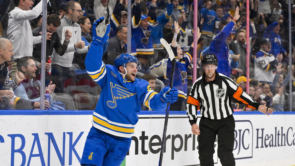 St. Louis Blues left wing Nathan Walker (26) reacts after scoring against the Calgary Flames during the second period at Enterprise Center.