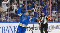 St. Louis Blues left wing Nathan Walker (26) reacts after scoring against the Calgary Flames during the second period at Enterprise Center.