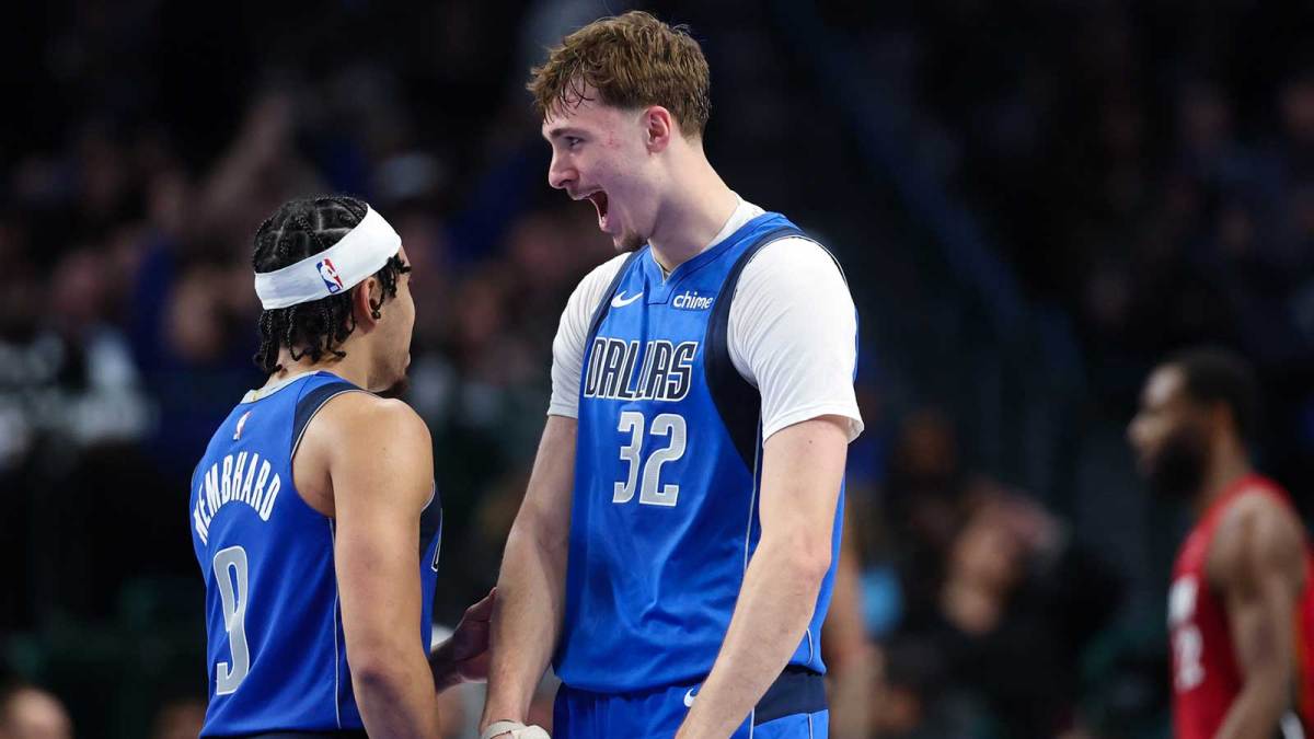 Dallas Mavericks forward Cooper Flagg (32) celebrates with Dallas Mavericks guard Ryan Nembhard (9) after scoring during the fourth quarter against the Miami Heat at American Airlines Center