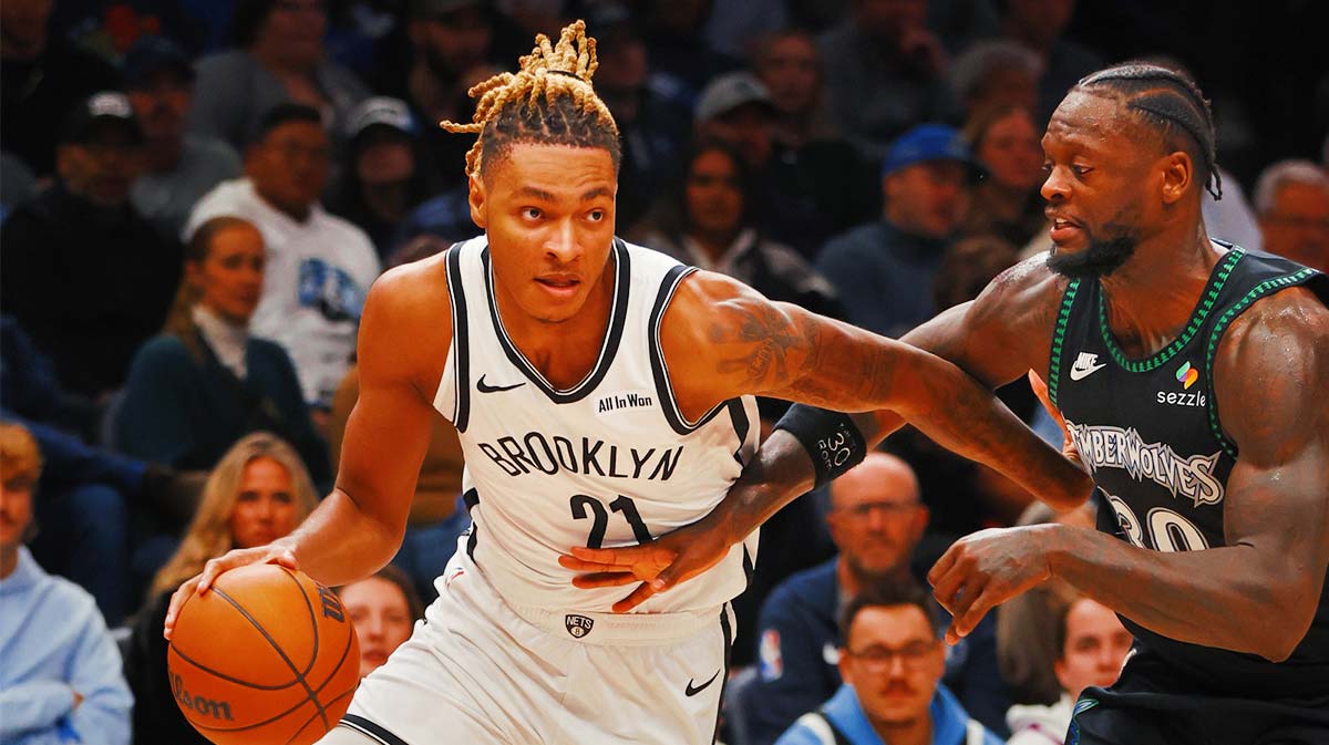 Brooklyn Nets forward Noah Clowney (21) works around Minnesota Timberwolves forward Julius Randle (30) in the third quarter at Target Center.