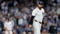 New York Yankees pitcher Devin Williams (38) reacts after giving up a two run RBI during the seventh inning during game four of the ALDS round for the 2025 MLB playoffs at Yankee Stadium.