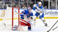 New York Rangers goaltender Igor Shesterkin (31) defends the net against St. Louis Blues left wing Pavel Buchnevich (89) during the second period at Enterprise Center. Mandatory Credit: Jeff Curry-Imagn Images