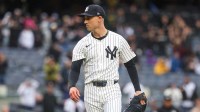 New York Yankees relief pitcher Luke Weaver (30) reacts after closing the game against the Texas Rangers at Yankee Stadium. Mandatory Credit: Vincent Carchietta-Imagn Images
