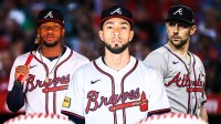Robert Suarez in an Atlanta Braves jersey in front of image. In background on left, Braves Ronald Acuna Jr. In background on right, Braves Spencer Strider.