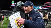 Philadelphia Eagles head coach Nick Sirianni speaks with Chicago Bears head coach Ben Johnson after the game at Lincoln Financial Field.