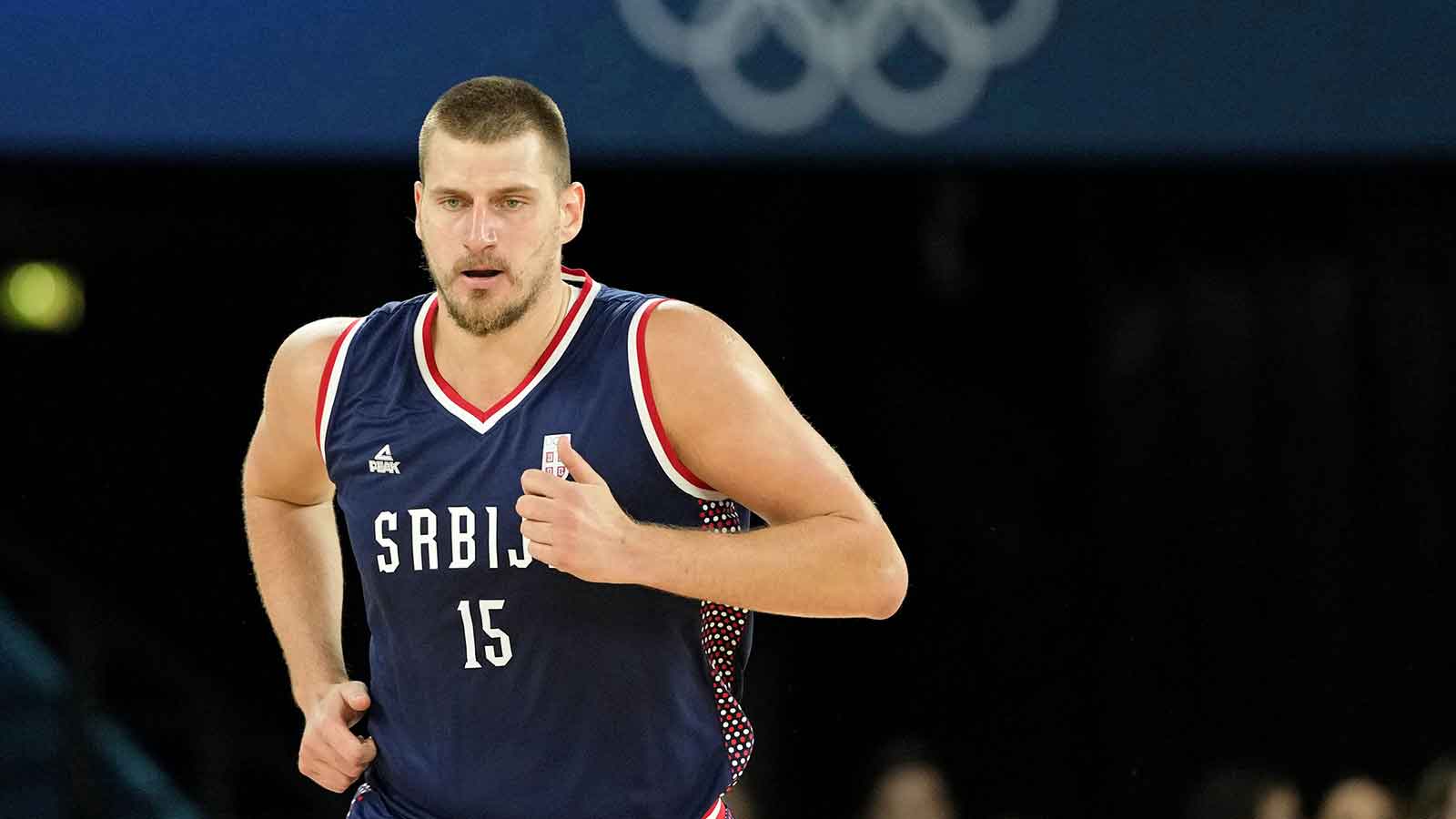 Serbia power forward Nikola Jokic (15) runs up the court against Germany in the men's basketball bronze medal game during the Paris 2024 Olympic Summer Games at Accor Arena.