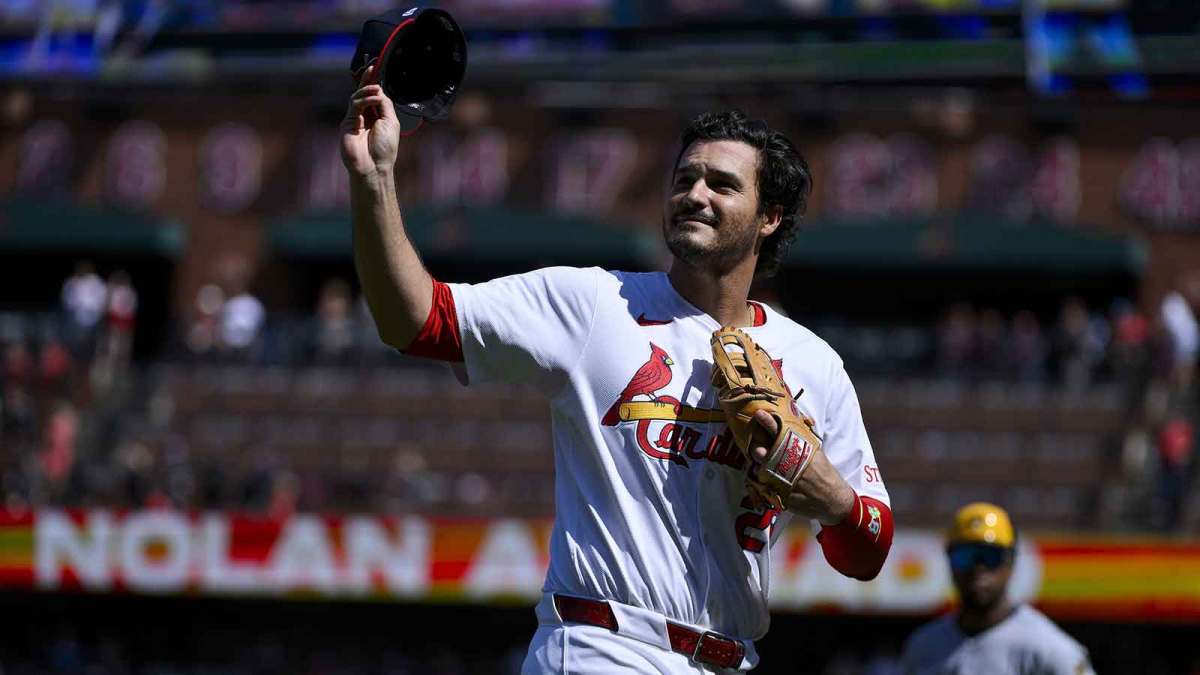 St. Louis Cardinals third baseman Nolan Arenado (28) salutes the fans after he was ceremonially removed before the start of the first inning against the Milwaukee Brewers at Busch Stadium.