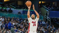 Miami Heat guard Norman Powell (24) shoots a three point basket during the second quarter against the Orlando Magic at Kia Center.