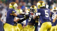 Notre Dame safety Adon Shuler (8) celebrates after forcing a Southern California fumble in the second half of a NCAA football game at Notre Dame Stadium on Saturday, Oct. 18, 2025, in South Bend.