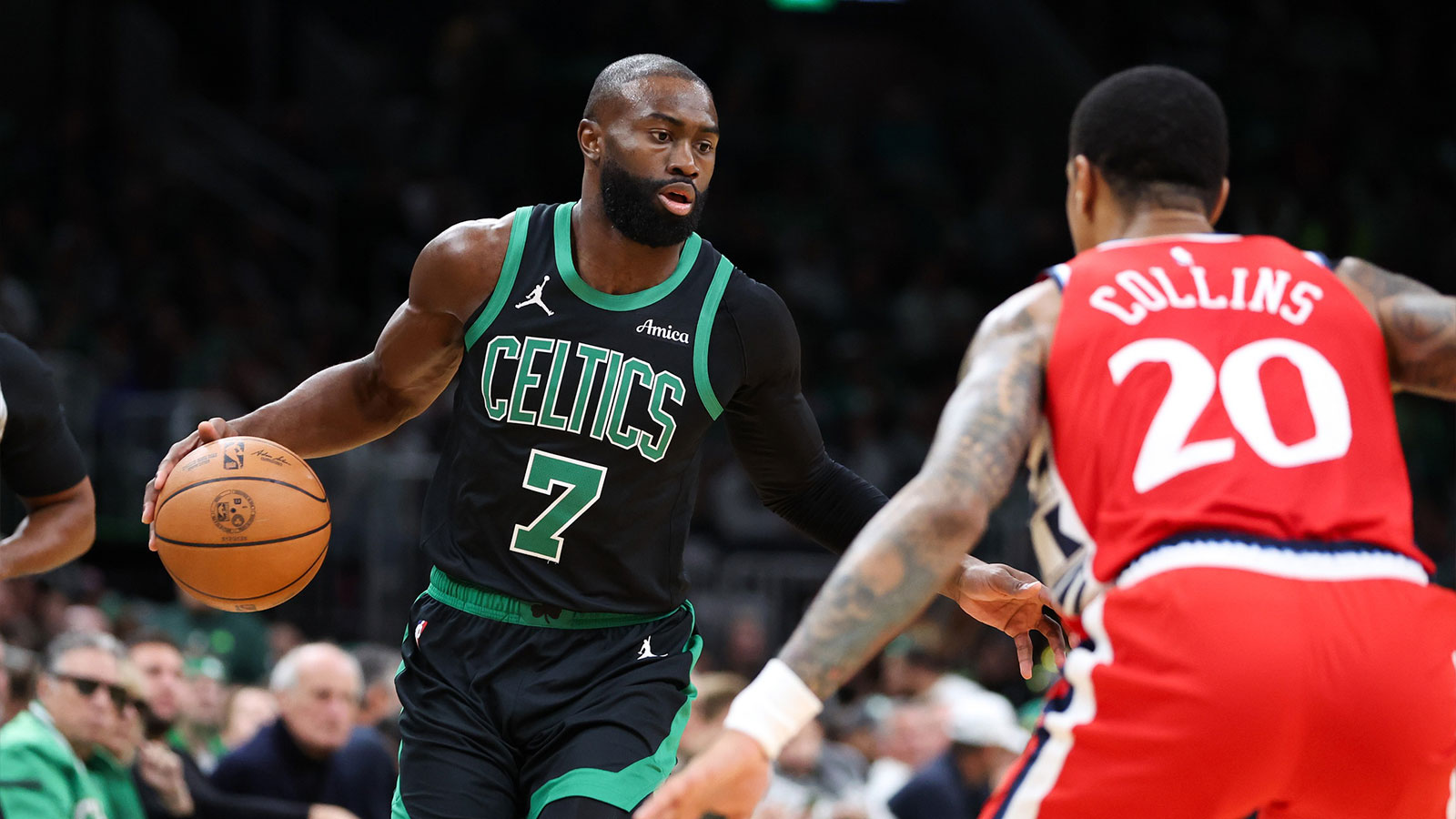 Boston Celtics forward Jaylen Brown (7) dribbles down the court during the first half against the Los Angeles Clippers at TD Garden. Mandatory Credit: Paul Rutherford-Imagn Images