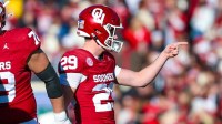 Oklahoma Sooners kicker Tate Sandell (29) reacts after making a field goal during the first half against the Louisiana State Tigers at Gaylord Family-Oklahoma Memorial Stadium.