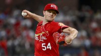 St. Louis Cardinals starting pitcher Sonny Gray (54) pitches against the Milwaukee Brewers during the first inning at Busch Stadium.