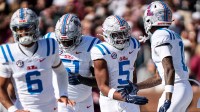 Ole Miss running back Kewan Lacy (5) celebrates with Ole Miss wide receiver Deuce Alexander (11) after scoring a touchdown.
