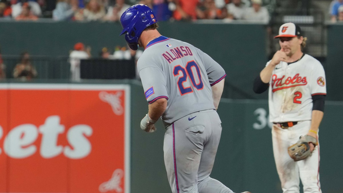 New York Mets first baseman Pete Alonso (20) rounds the bases following his two run home run during the eighth inning against the Baltimore Orioles Oriole Park at Camden Yards.