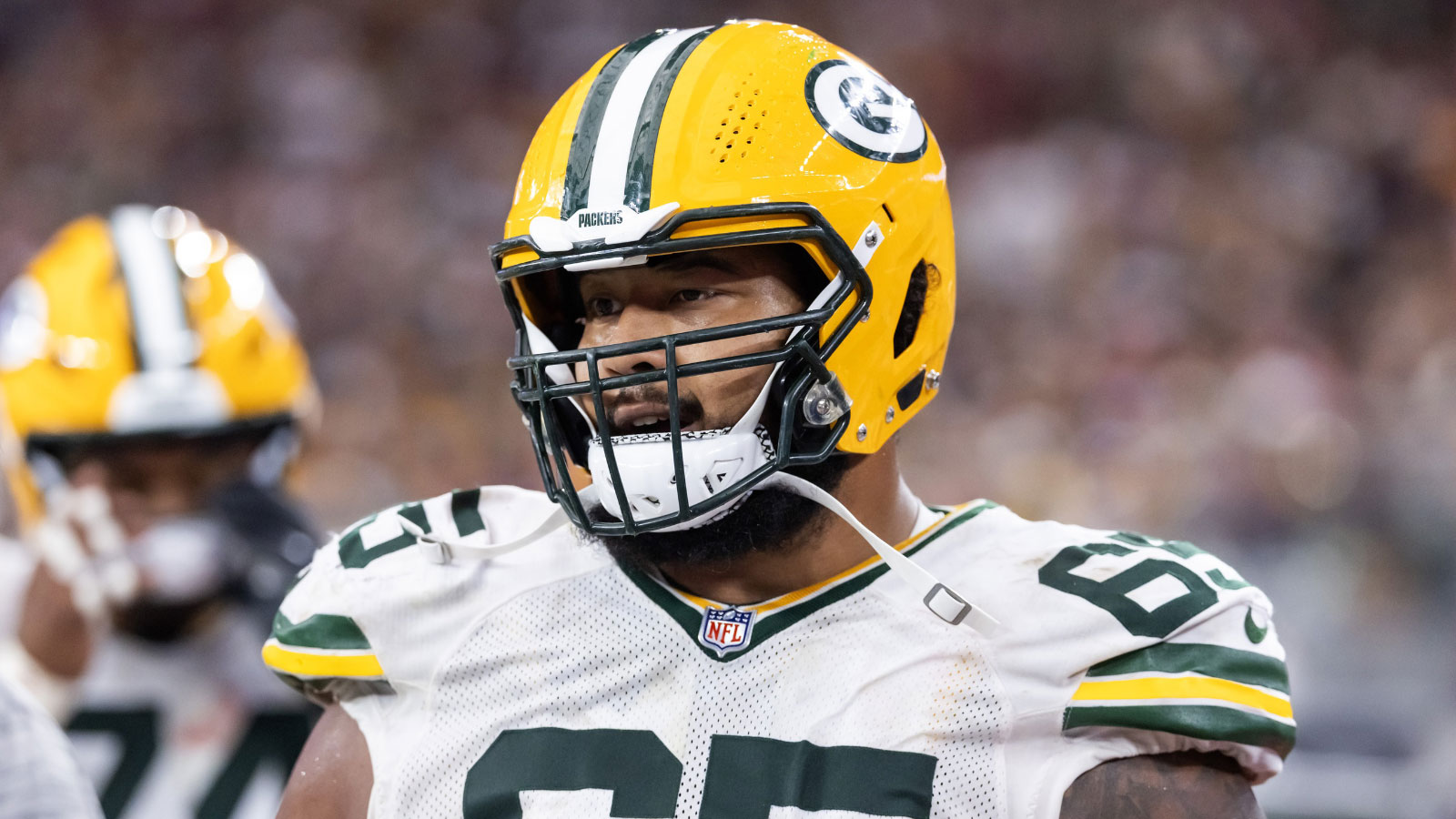 Green Bay Packers guard Aaron Banks (65) against the Arizona Cardinals at State Farm Stadium.