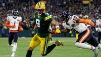 Green Bay Packers wide receiver Christian Watson (9) runs the ball in for a touchdown during a football game against the Chicago Bears on Dec. 7, 2025, at Lambeau Field in Green Bay, Wis. The Packers defeated the Bears 28-21.