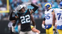 Carolina Panthers safety Lathan Ransom (22) celebrates after a play during the third quarter against the Los Angeles Rams at Bank of America Stadium.