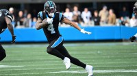 Carolina Panthers wide receiver Tetairoa McMillan (4) with the ball in the third quarter at Bank of America Stadium.