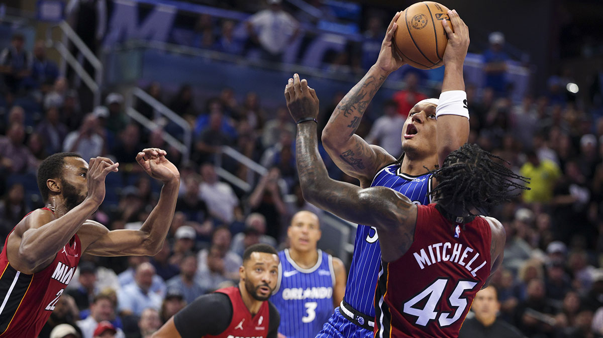 Orlando Magic forward Paolo Banchero (5) shoots the ball against the Miami Heat in the fourth quarter at Kia Center.