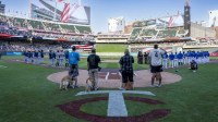 A general view of Target Field during the national anthem and a moment of silence for tragic events in regards to Mark and Democratic Former House Speaker Melissa Hortman’s deaths before a game between Milwaukee Brewers and Minnesota Twins at Target Field.